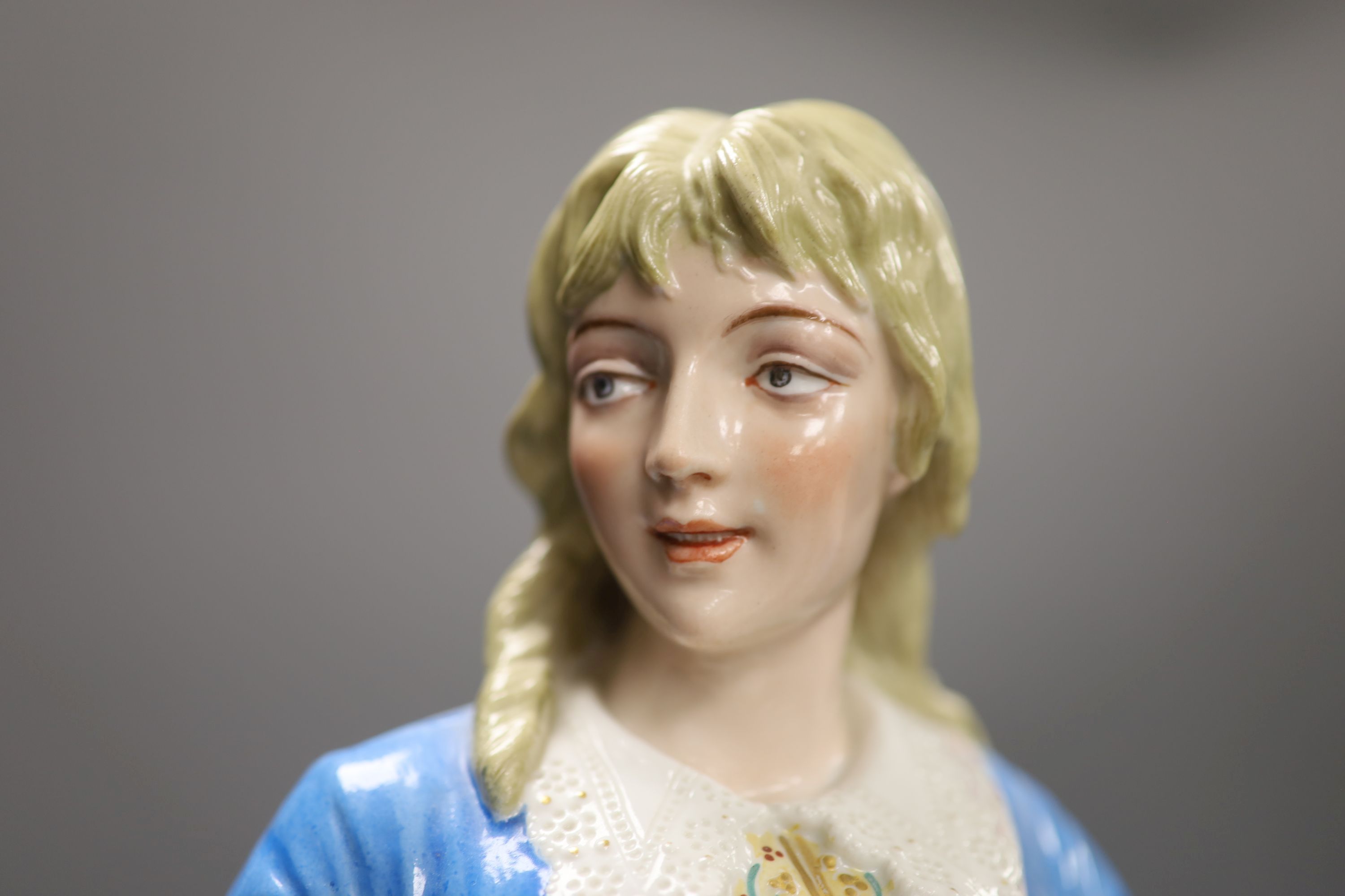 A pair of large Paris porcelain figures of a lady and gent, tallest 52.5cm